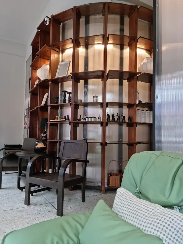 Wooden display shelves with oils and spa products